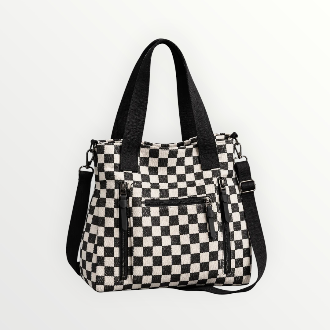 Borsa shopper Alessia Vellani a scacchiera bianca e nera con tasche frontali con zip e tracolla regolabile